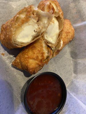 Crab Rangoon egg rolls with sweet chili sauce