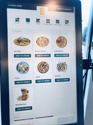 You can order through a kiosk or in person