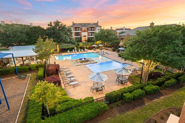 Aerial photo of two swimming pools at Onion Creek Luxury Apartments