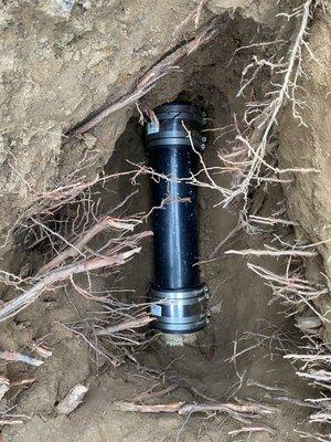 4 inch sewer spot repair due to root intrusion in ac pipe!