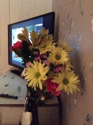 Fresh flowers in the room and at the breakfast table each morning