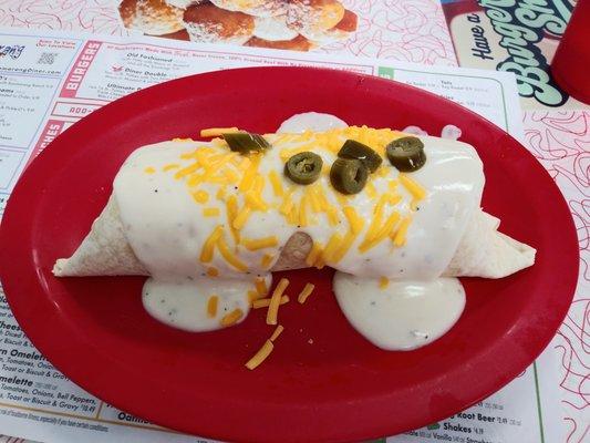 Breakfast burrito with country gravy.  It works!