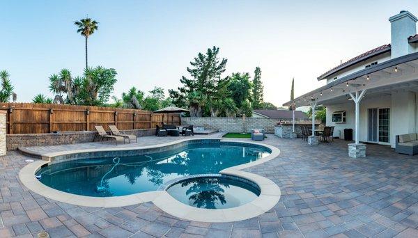 New pool construction, ad pavers design around it with artificial turf in Thousand Oaks, CA.