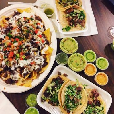 BEEF nachoes and carne asada tacos and Lengua tacos.