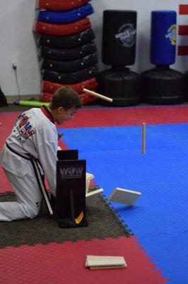 Breaking 3 boards for black belt testing