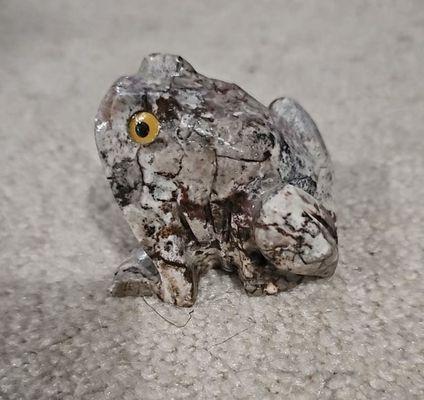 Stone carved frog