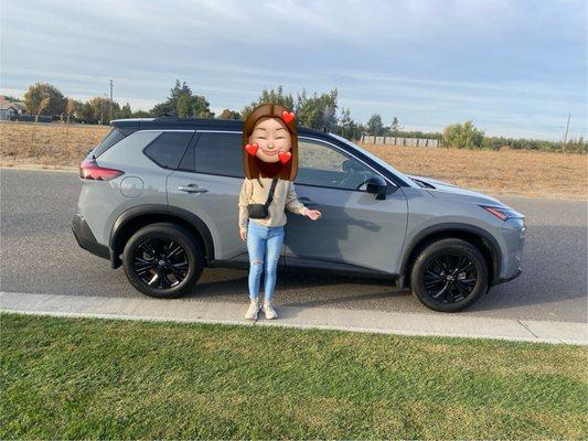 My daughter and her new car!