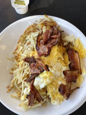 Egg, cheese and bacon hash brown bowl