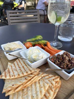 Dip Board - Hummus, Whipped Feta & Olive Tapenade with gluten free flatbread crust made into crackers.