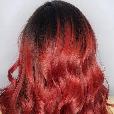 Old faded hair brought back to life with shiny fire red