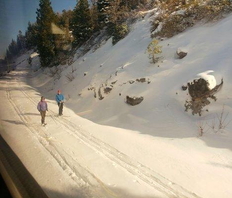 Cross country skiiers near the tracks in Truckee