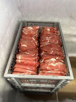 Fresh frozen sliced lamb before packaging