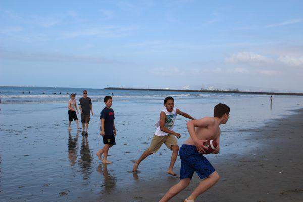 Students enjoy a day at the beach to celebrate the end of the school year.