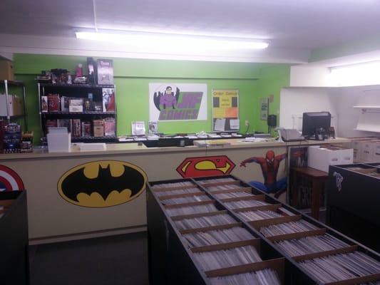 Our counter, behind it is where we keep our subscriber's comics & our hold shelf.