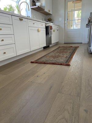 Beautiful flooring installed by Armen and his team in our new kitchen.