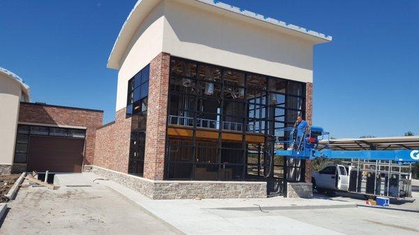 Curtain walls going up on the new car wash