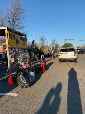 VHLC tree lot-- the volunteers trim it, load it and tie it securely to your vehicle.