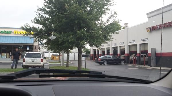 This is the rude clerk after he spent some time with his gf... he's walking away from her car.