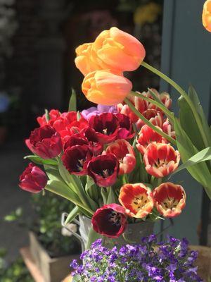 Fresh flowers outside as you walk by for sale