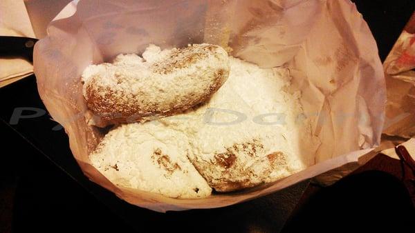 Beignets covered in powdered sugar