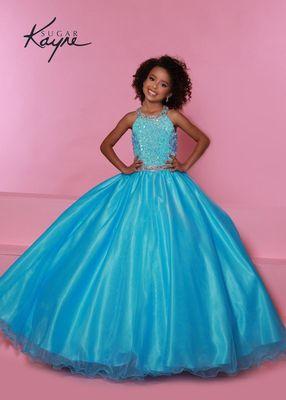 We carry little girl Pageant dresses from 6M up to size 16 in stock. If you want to feel like a Pageant Princess come see us!