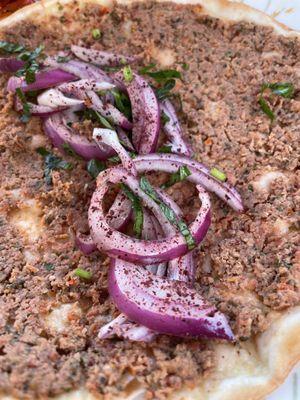 How I like to eat my lahmajun. With onion,sumac and parsley