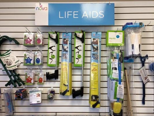 Aids for Daily Living: grabbers, dressing sticks, leg lifters, long handled sponge