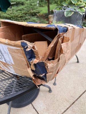 Shipping box damaged by UPS.