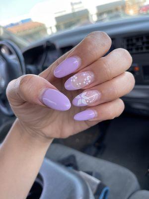 Almond shaped gel full set French/solid combo with flower detail, two colors. (3 weeks old)