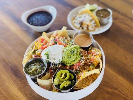 Nachos Grandes( black beans on the side) and a Birria taco