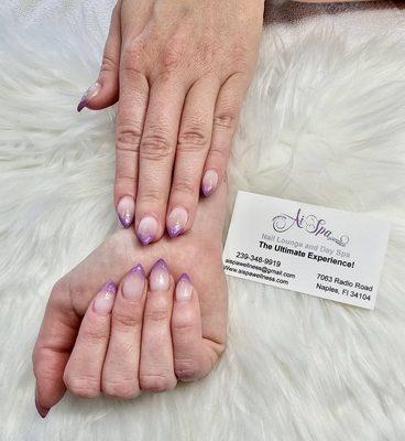 Get mesmerized by our pink to purple gradient nails!  A touch of elegance awaits at AiSpa & Nails. #GradientGlam