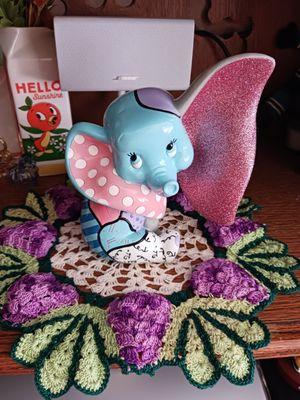 Purchased this beautiful doily for my sweet Dumbo to sit on. Super happy with this one of a kind item.