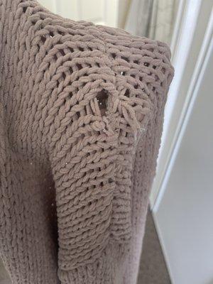 Damaged sweater