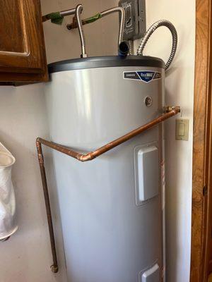 New water heater larger than old one; he made it fit.