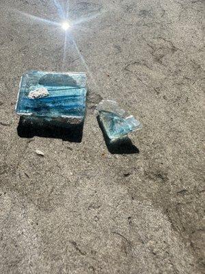 Glass from the pool that they didn't clean up