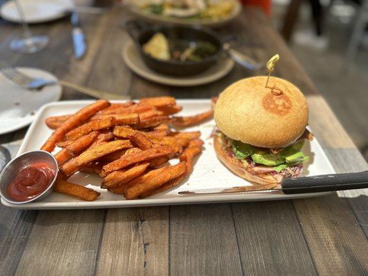 Salmon sando with blackened sweet potato fries