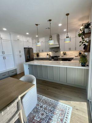 Individual family member lockers (mud room area); cabinet door entrance into hidden pantry and kitchen