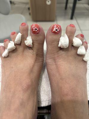 Regular pedicure with big toe design