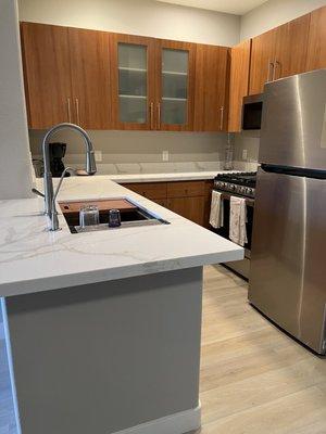 Kitchen lowered countertop installed appliances painted walls