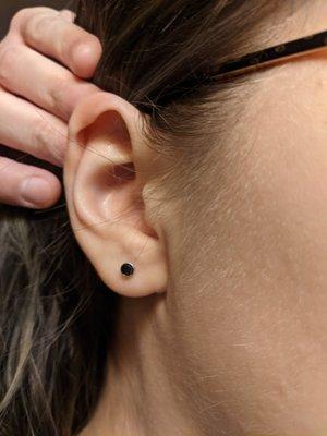 (Taken the night of the piercing.) Helix and gauge.