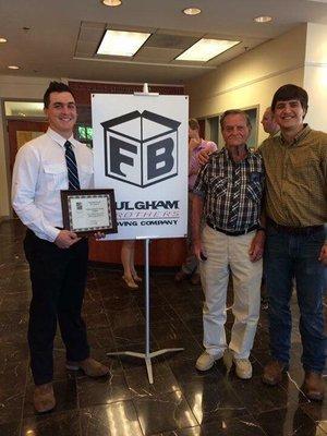 Owners Tripp and Trevor Fulgham with their grandfather at the ribbon cutting ceremony