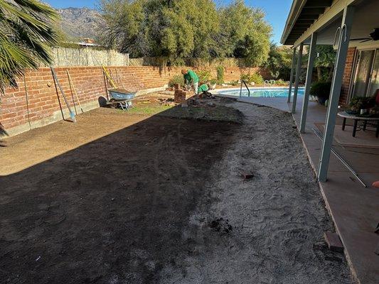 The start of a installation of synthetic grass