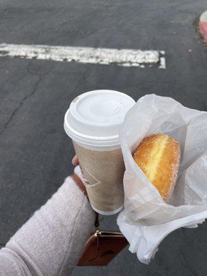 A large coffee and donut