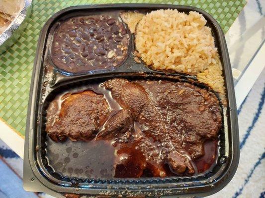 Mole Poblano - Chicken and Mexican sauce, with rice, beans and hand made tortillas.