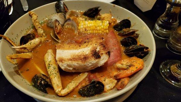 Cioppino! Do not skip. Plan on getting messy!