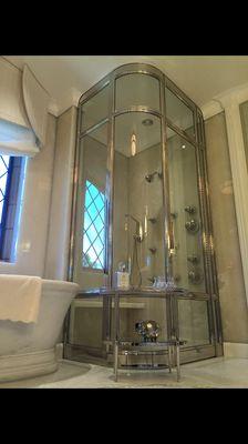 Schicker Luxury Shower Doors worked with the architect and homeowner to design this custom shower door.