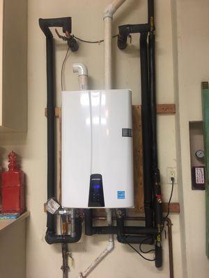 Navian tankless install with built in recirc pump.