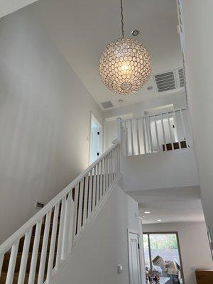 Capiz Light hung from a 20 ft ceiling