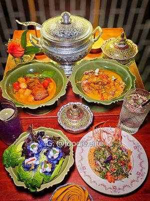 Royal flower dumplings, duck curry sauce, crab coconut curry, royal Thai spicy herbal shrimp salad.