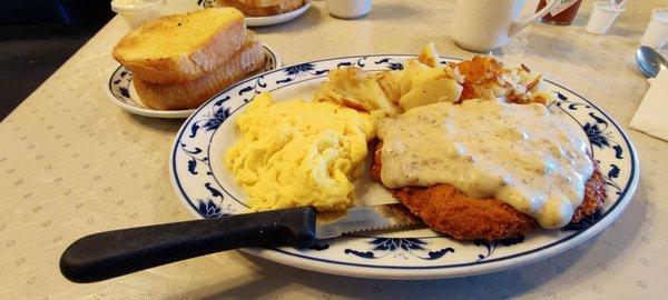 Country fried steak and eggs